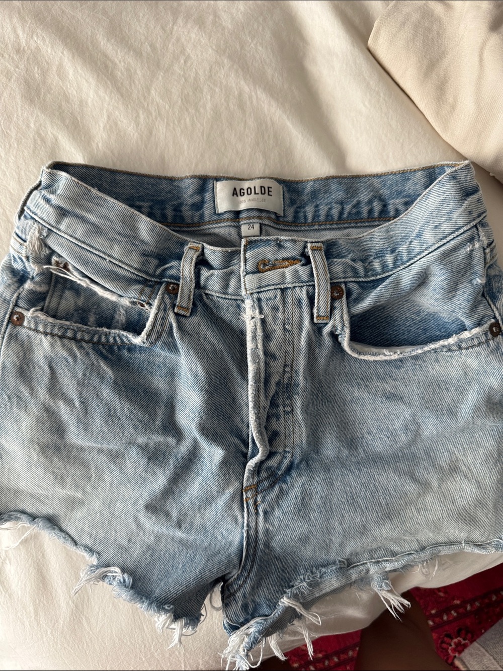 Agolde Light Blue Distressed Denim Shorts